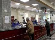 عکس برگزیده رویترز از روزهای کرونایی در بانک ایرانی