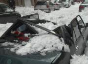 عکس/ خودرویی که با برف نابود شد